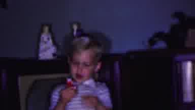Cleveland Ohio USA (1953): Little Blonde Boy Is Showing Off His Figurine Than