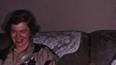 Cleveland Ohio USA (1953): Two Adults Sitting On A Couch Enjoying Each Others