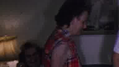 Cleveland Ohio USA (1953): Old Woman Sitting Down On A Couch At Family Gathering