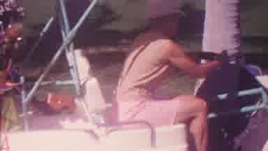 Hawaii USA (1962): Man Resting In Golf Cart Watching Someone Else Play Golf