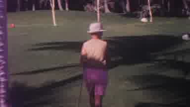 Hawaii USA (1962): A Woman Is Walking Towards Her Croquet Ball