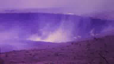Hawaii USA (1962): A Fog Of Smoke Rises From A Large Crater In The Ground