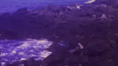 Hawaii USA (1962): Man Gestures To Crashing Shore Below