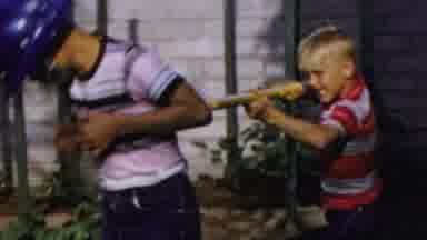 Columbus Ohio USA (1954): Child With A Helmet And A Police Pretend Badge Grabs