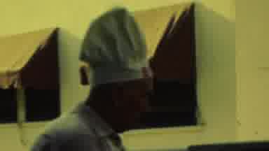Seaside New Jersey USA (1949): Man In Big Chef Hat Cooks On Brick Grill