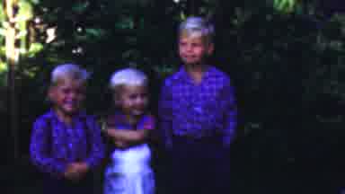 Seaside New Jersey USA (1949): Three Happy Blond Boys Standing In Front Of Bushes