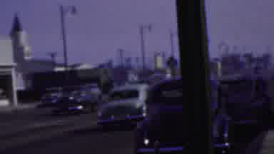 Seaside New Jersey USA (1949): Vintage Cars Going Down The Busy Street A Kid Happy