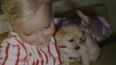 Seaside New Jersey USA (1949): Young Girl In Pajamas Giving Small Puppy Dog A Hug