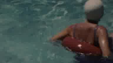 SEASIDE NEW JERSEY USA-1949: Man Coming Out From Swimming Pool With Smile