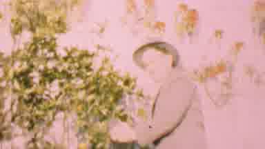 San Diego California USA (1955): Woman Looking At Another Holding A Baby