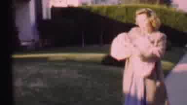 San Diego California USA (1955): Middle Aged Lady Is Walking Down The Sidewalk