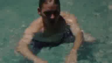 Seaside New Jersey USA (1949): Man In Black Trucks Swimming In Pool