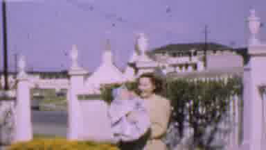 San Diego California USA (1955): A Beautiful Mother Is Playing With Her Kid