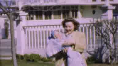 San Diego California USA (1955): Mom Walking And Waving With Baby While Dad