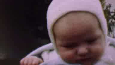 This grandma's got her smooch on ... no pacifier needed