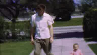 Father supposedly walking, actually just chasing Happy Baby's escaped joy
