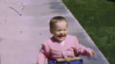 San Diego California USA (1955): Toddler Boy With Blonde Hair On Bike In The