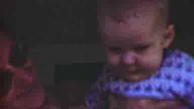 San Diego California USA (1955): Chubby Cheeks Cute Baby Held In The Air
