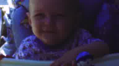 San Diego California USA (1955): A Baby Making Expressions In Its High Chair