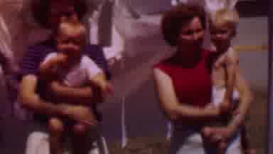 Phoenix Arizona USA (1956): Moms With Toddlers Outside With Laundry Blowing In The