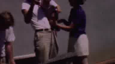 Phoenix Arizona USA-1956: Man Woman And Child Waving Near Construction Site