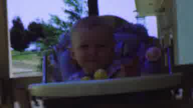 San Diego California USA (1955): Kid Is Playing In The High Chair