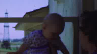 San Diego California USA (1955): Mother And Baby Relaxing On The Porch