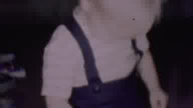 PHOENIX ARIZONA USA-1956: Home Video Of A Small Boy In Overalls
