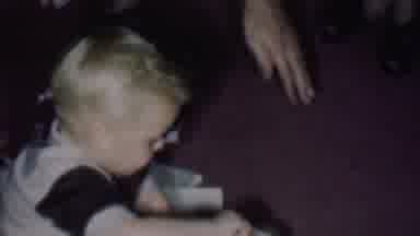 Phoenix Arizona USA (1956): Blonde Male Child Eating Cake With A Spoon While