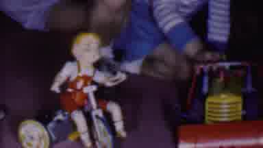 Phoenix Arizona USA (1956): Child Plays With Toys
