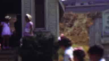 Dallas Texas USA (1956): Girl In Sunhat Twirls Her Arm