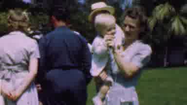 Dallas Texas USA (1956): Baby Eating Ice Cream With Mother On A Sunny Day