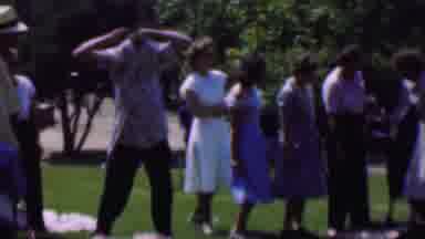 Dallas Texas USA (1956): People On The Park Playing Trying To Win