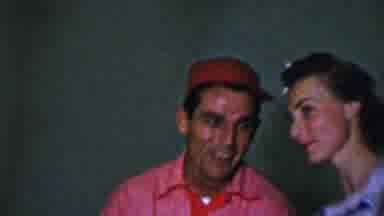 Dallas Texas USA (1956): A Man And Woman Act Playful And Then Four Woman Smile