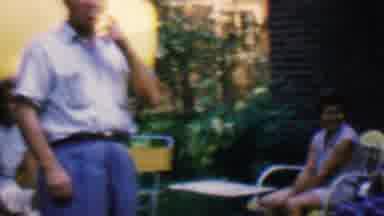 Covington Kentucky USA-1961: Family Gathering in Backyard with Patio Umbrella and 1960s Fashion