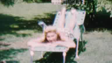 Hatfield Pennsylvania USA (1956): Girl Sunbathes On A Hot Summer Day