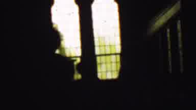 Detroit Michigan USA (1950): Silhouette Of People Walking Down Stairs In A