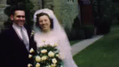 Detroit Michigan USA (1950): Bride And Groom Walk Happily Out Of A Church After