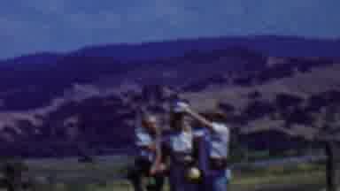Solvang California USA (1955): Happy Family Of Three Poses In Front Of Mountain