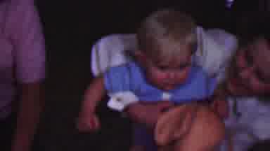 Terra Haute Indiana USA (1963): A Blond Child Looks Around Inquisitively While