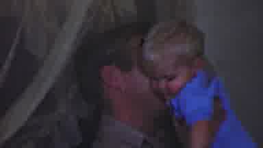Terra Haute Indiana USA (1963): Father Is Holding A Baby And Raising Him In His