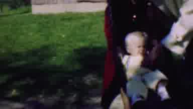 Terra Haute Indiana USA (1963): Adults Helping A Small Child Swing Safely