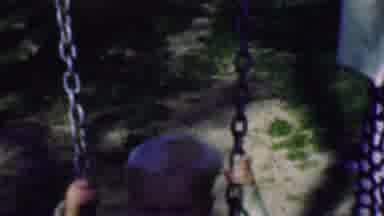 Terra Haute Indiana USA (1963): Small Child Swinging Outside In Yellow Outfit