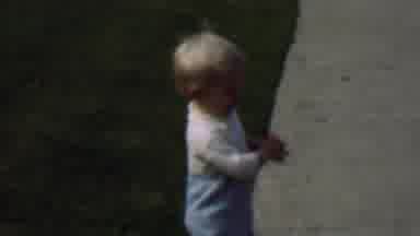 Terra Haute Indiana USA (1963): Little Blonde Boy Picking Up Toys On Sidewalk