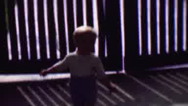 Terra Haute Indiana USA (1963): Small Child Running Around The Corner Of Living