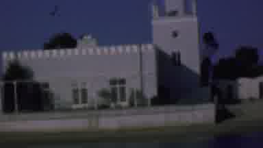 SAN DIEGO CALIFORNIA USA-1961: The Unique White Stucco Building with Crenellated Parapet