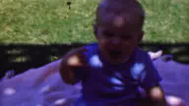 San Diego California USA (1961): Happy Baby Playing Outside In The Sunshine