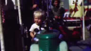 Terra Haute Indiana USA (1963): Little Boy Rides Ride At Theme Park