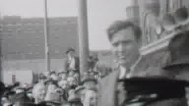 Albany New York USA (1937): People Walking And Jogging Across A Bridge Cheerfully