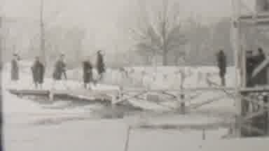 Albany New York USA (1937): People Walking Across A Bridge